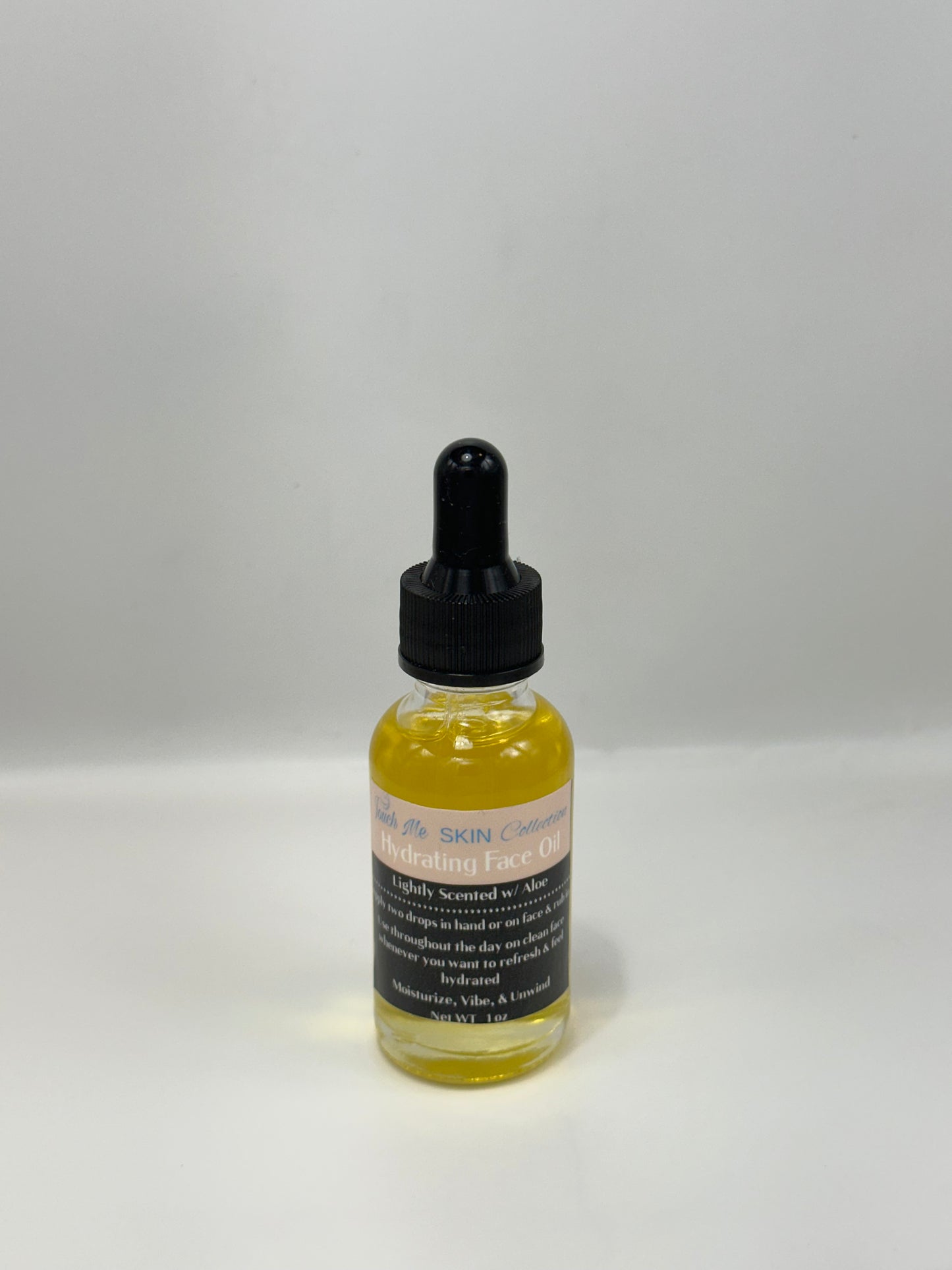 Face oil - lightly scented w/ aloe